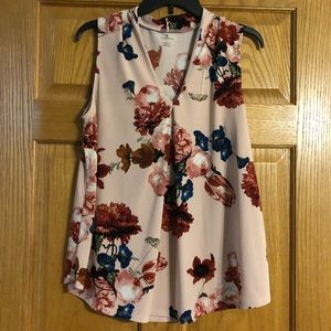 Sleeveless, floral blouse top